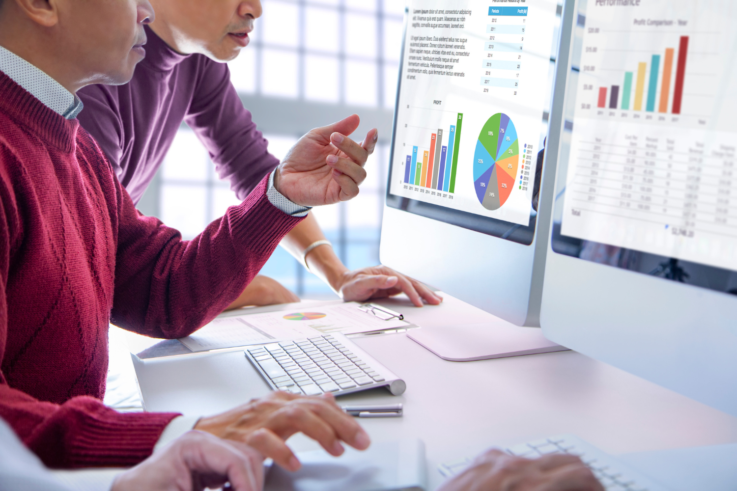 A business owner confidently reviewing data charts.
