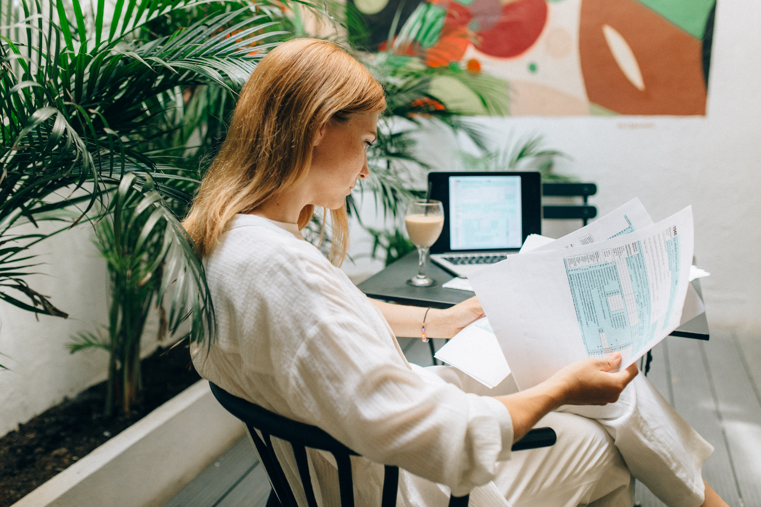 Business owner reviewing a checklist for selecting the right broker.