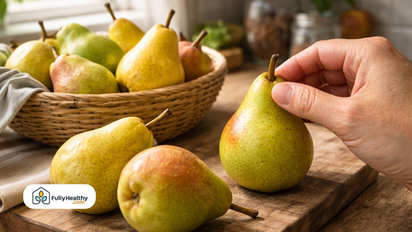 Hand gently pressing pear neck to check ripeness on kitchen counter