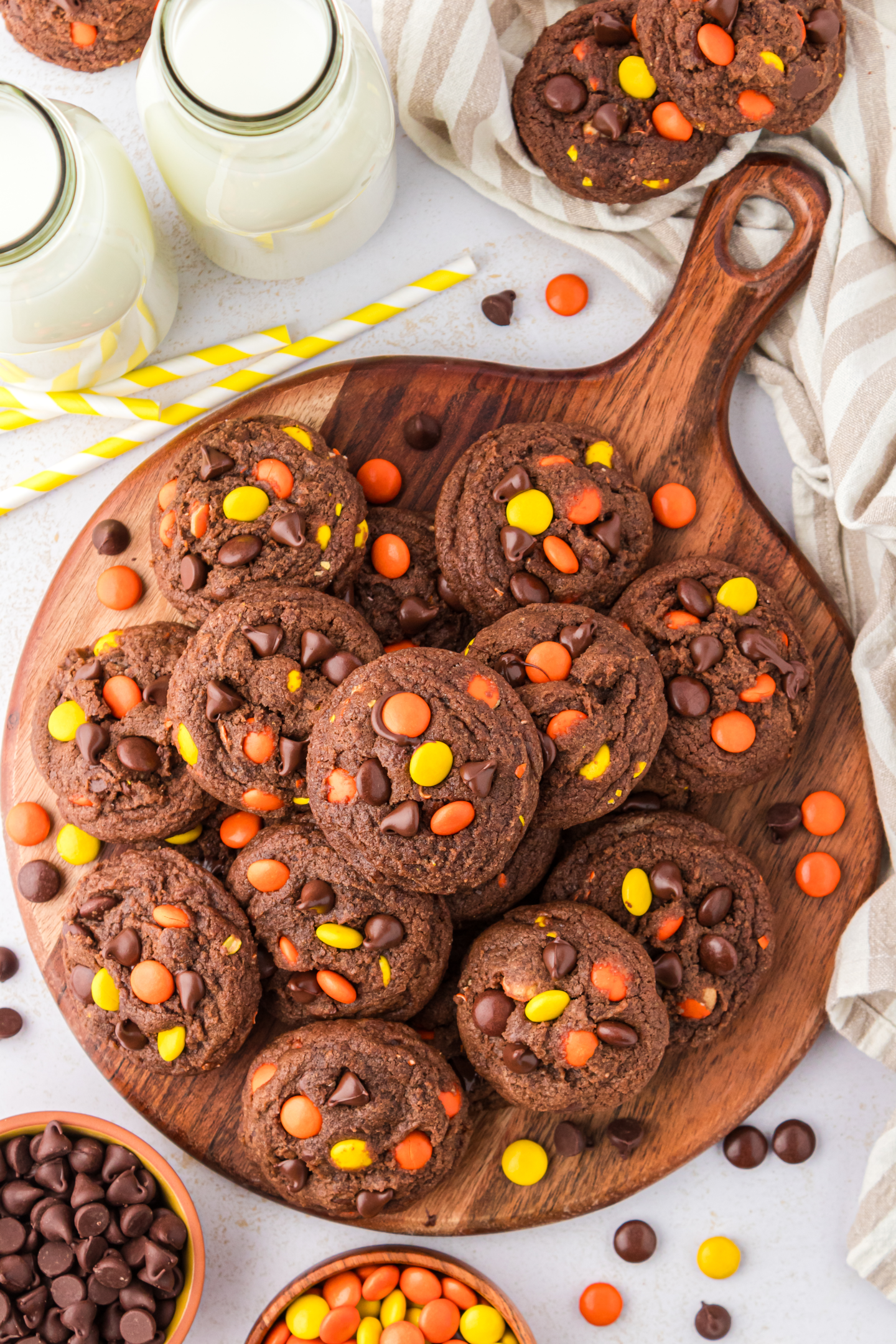 Reese's chocolate cookies on a wooden cutting board