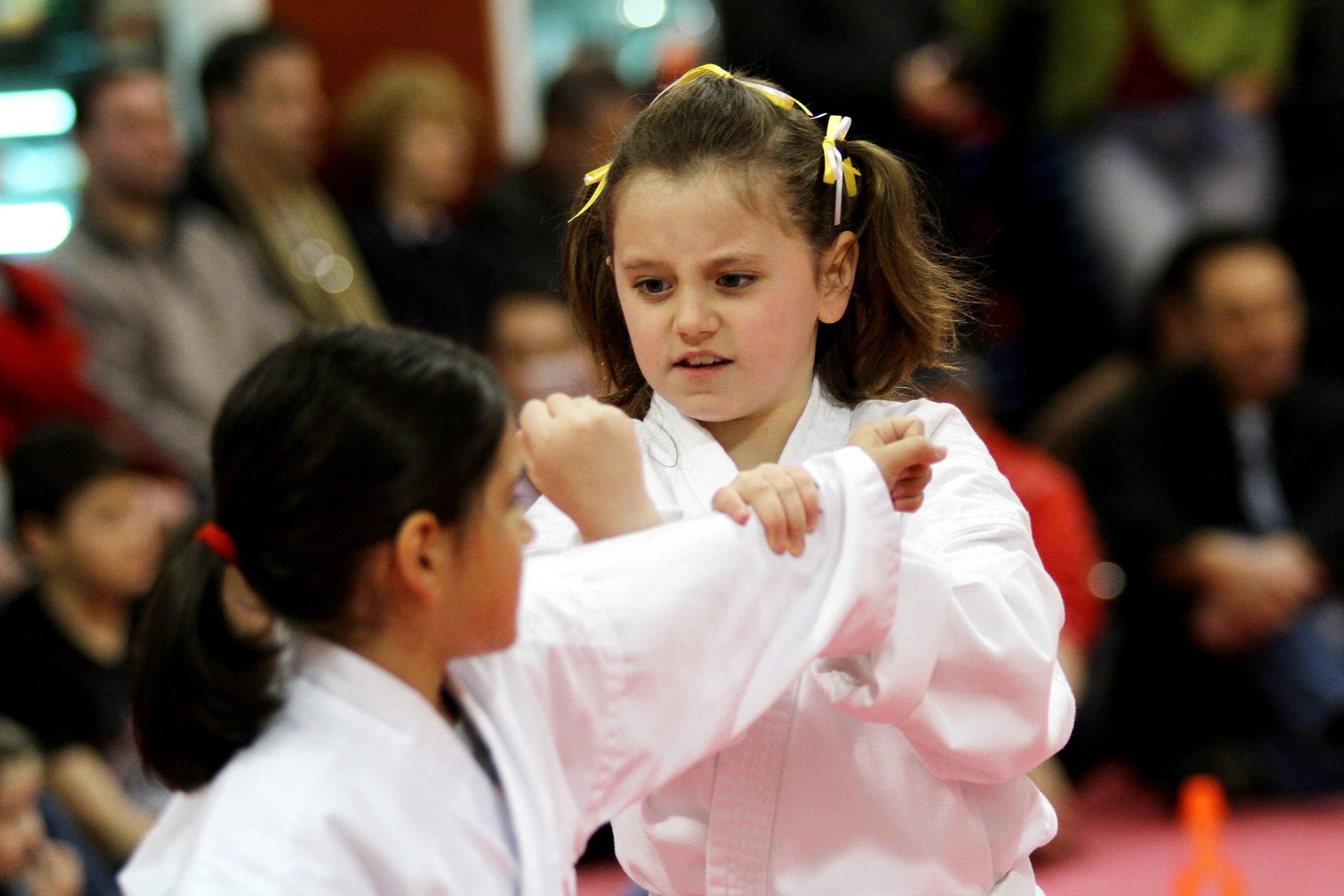 Martial arts enhance a child's development by teaching self-dicscipline, raising stranger danger awareness.