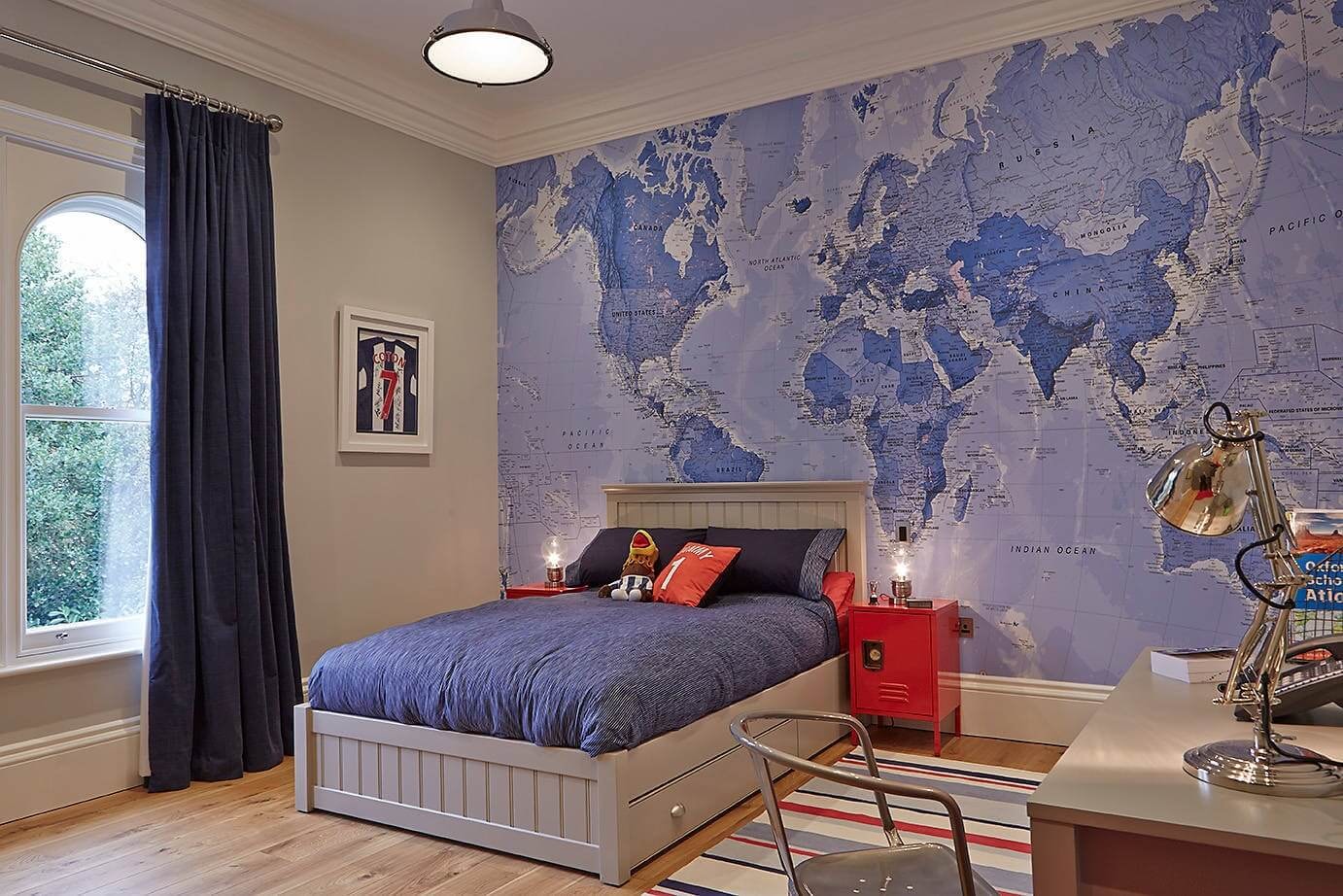 bedroom with educational world map background