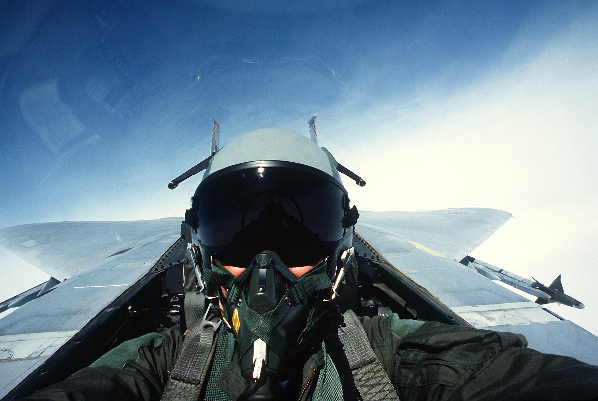 A fighter jet pilot in the cockpit 