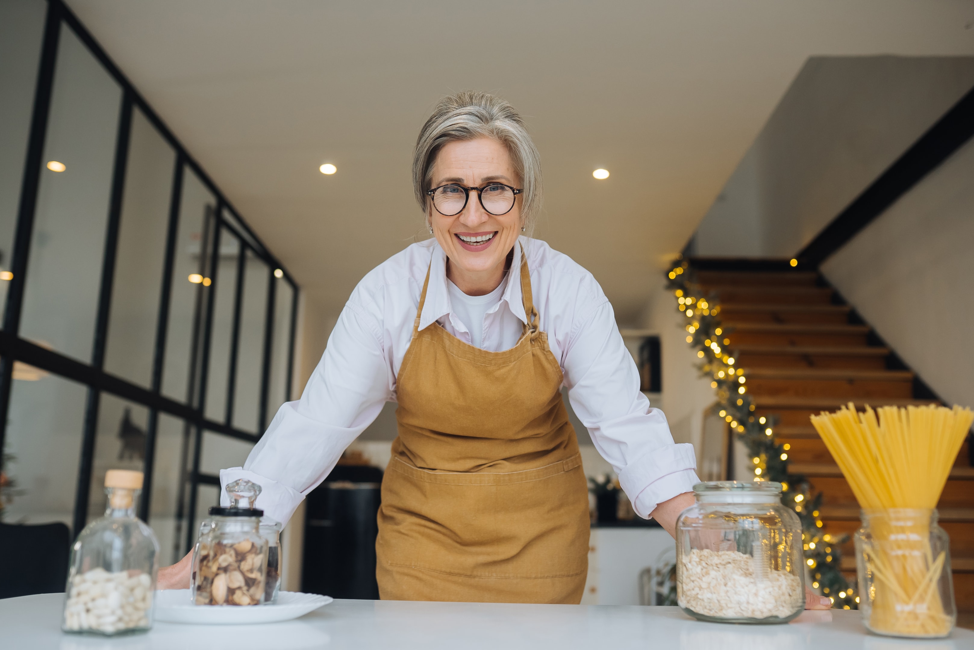 a smiling woman who has quickly healed after dental implant surgery