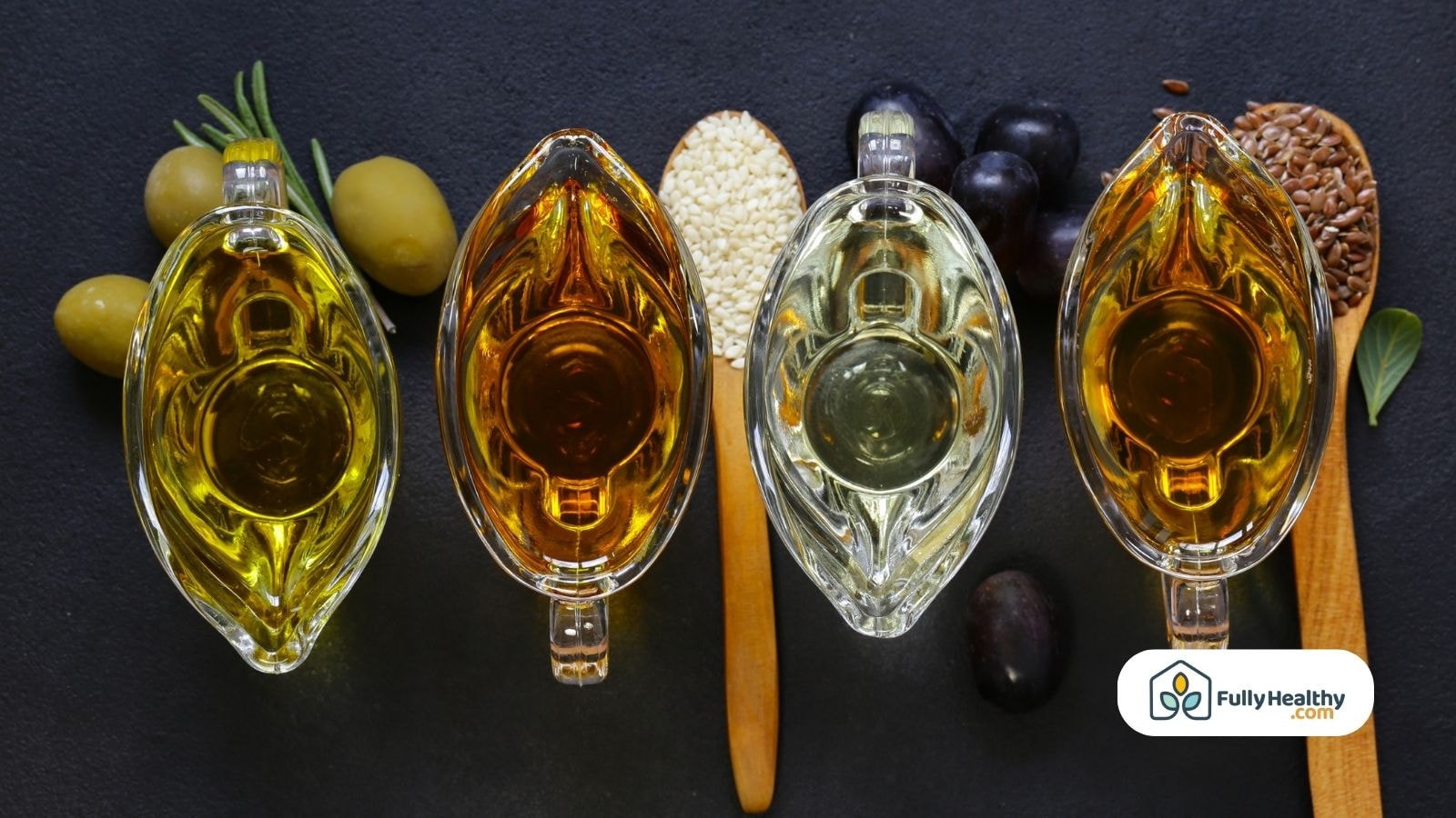 Different cooking oils displayed in glass containers with the ingredients in below them