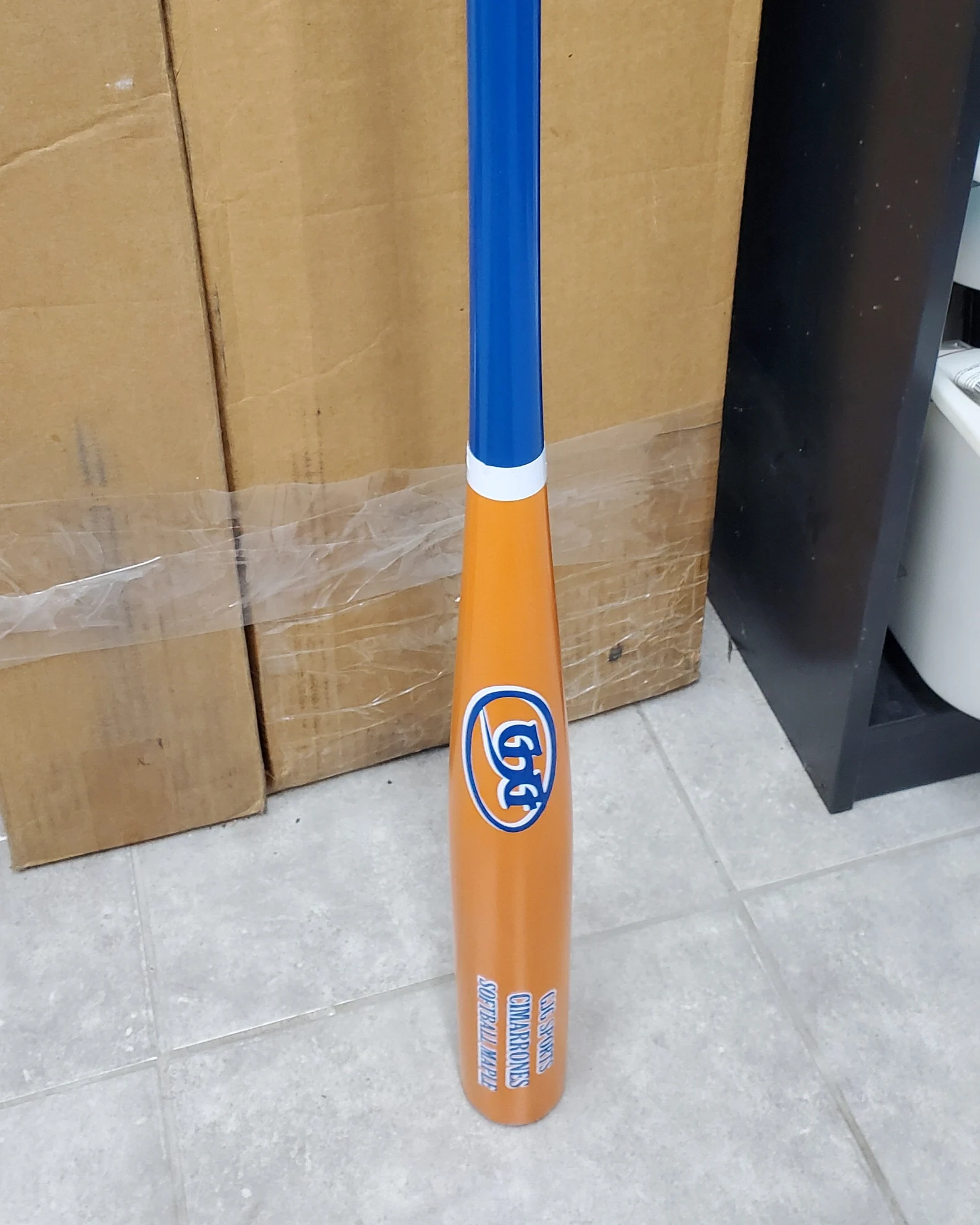 GJG Sports on Etsy offers engraving and customization options for softball and baseball bats. Like this Orange and blue bat.