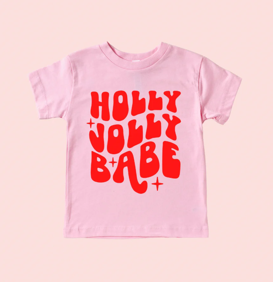 pink crew neck tee with the words "Holly Jolly Babe" printed on it in red