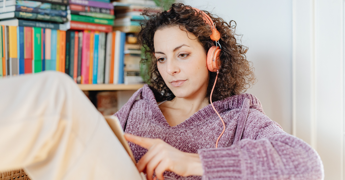 A woman reviewing tax forms and invoices for her business, representing what is contract labor on schedule c for OnlyFans creators.