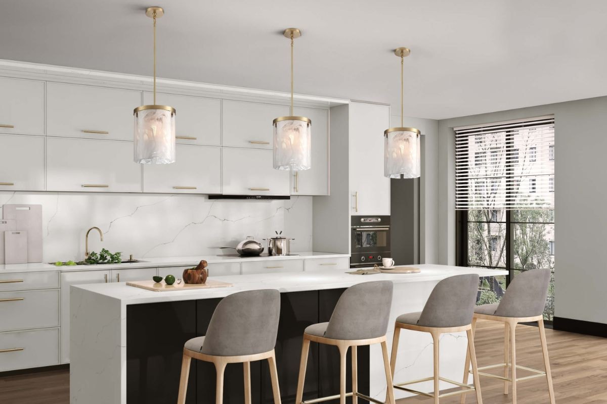 Elegant Skye pendants as ceiling lights above a kitchen island, versatile light fixtures for any room design.