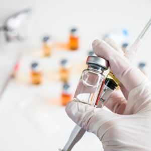 picture of vaccine and syringe