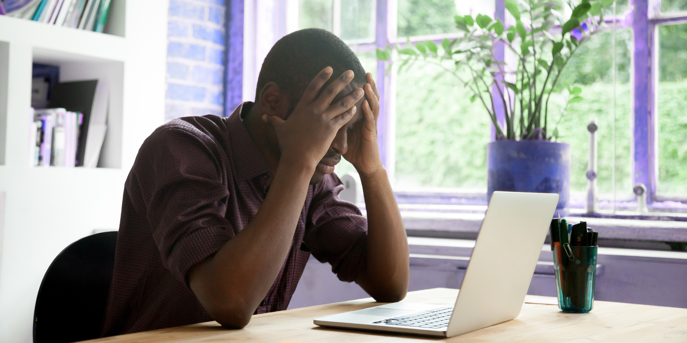 Remote worker frustrated by instant messaging overload and technical difficulties while working remotely, highlighting communication challenges and the need for better remote communication tools.