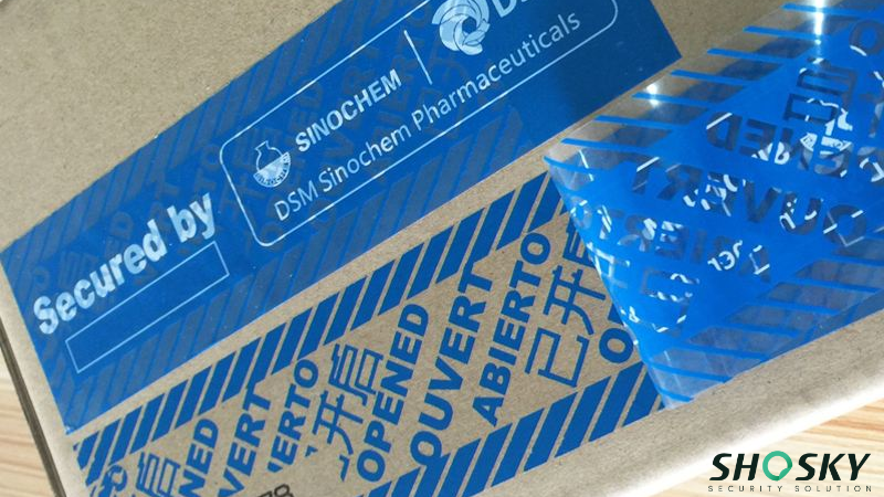 Blue pharma seal revealing “OPENED” in multiple languages after tampering