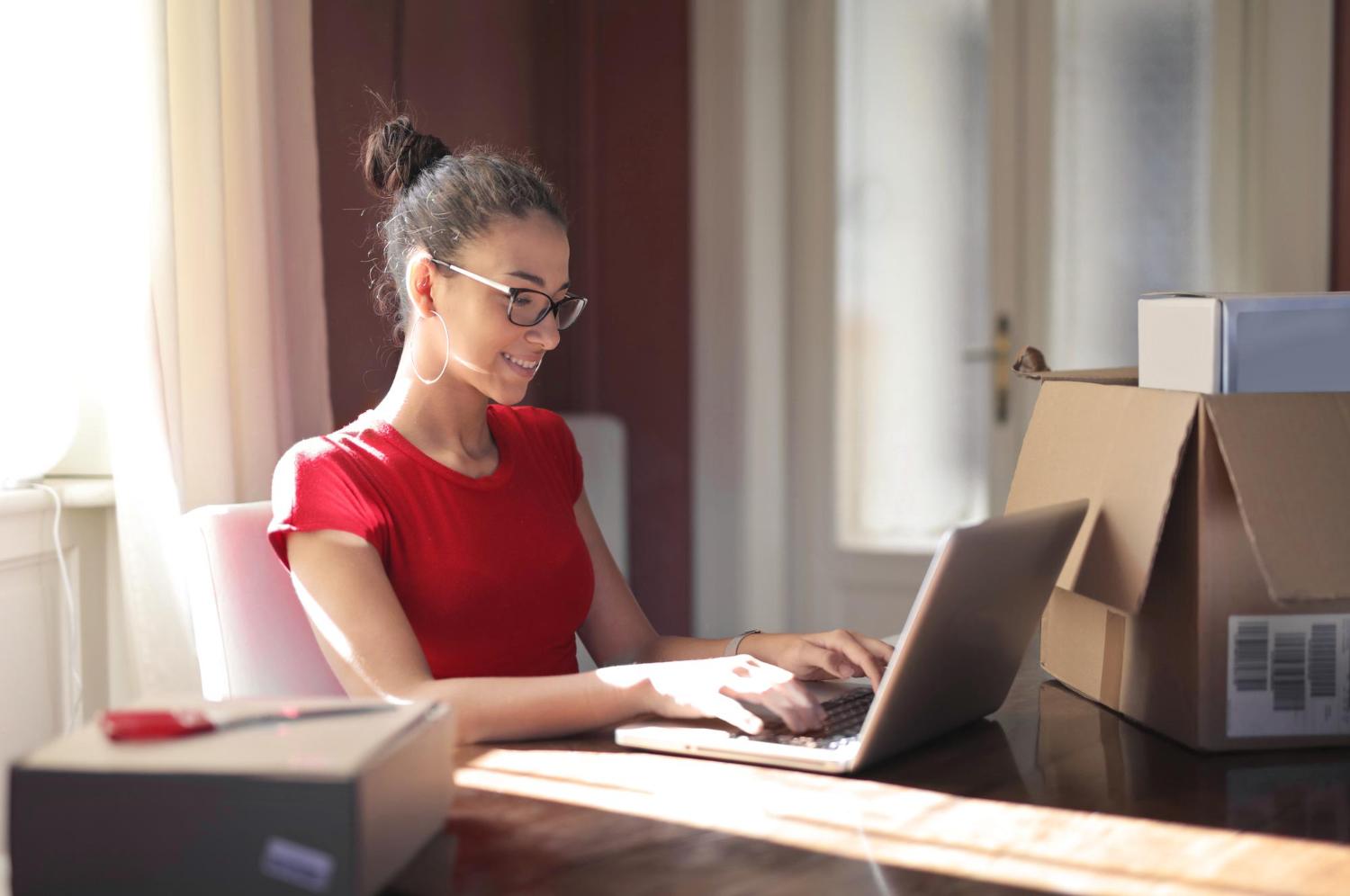 Woman looking through installed apps to test AI tools.
