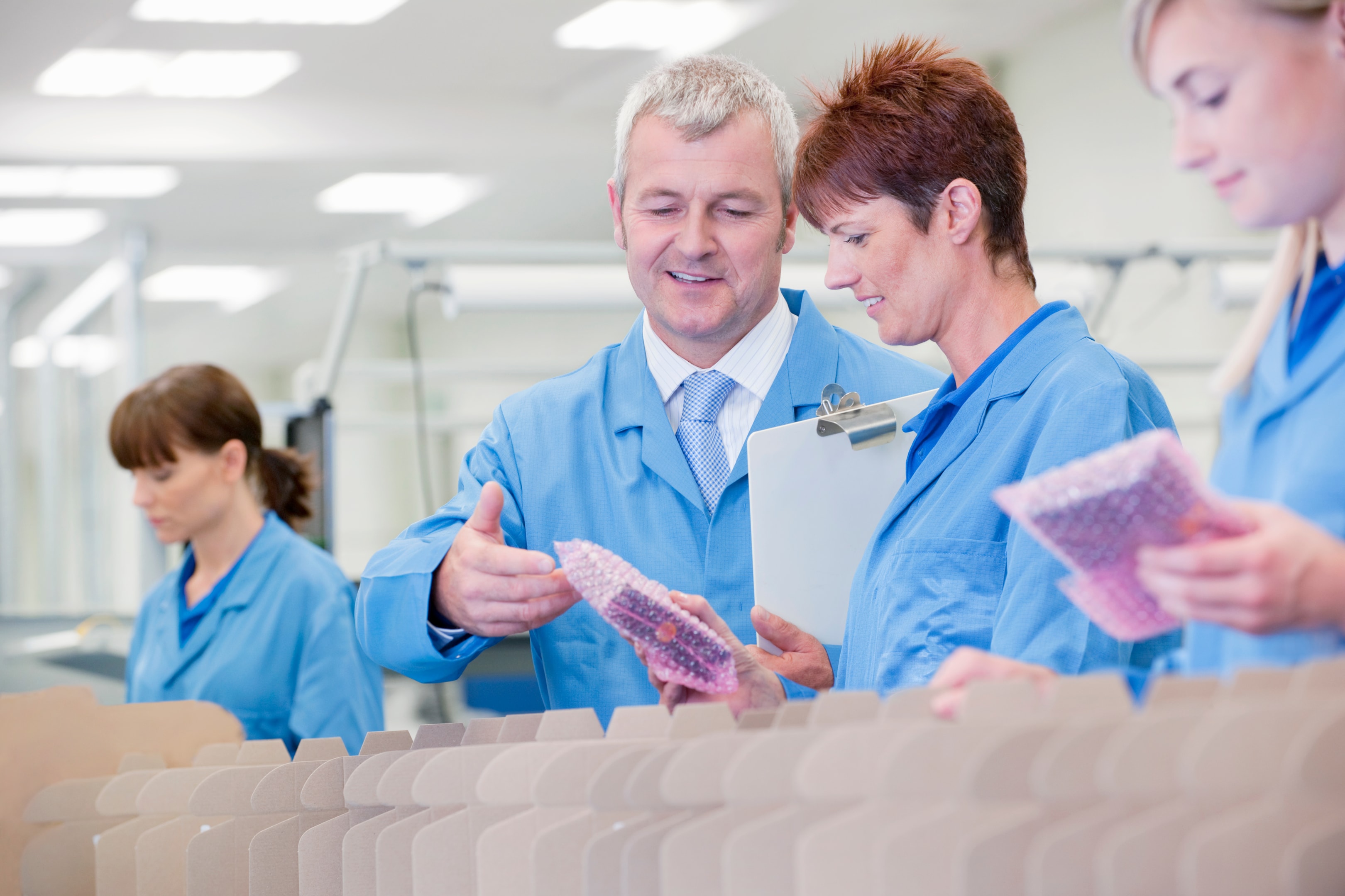 Workers from qld health working in hospital