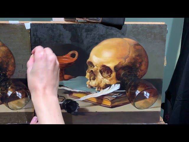 Oiling out involves gently applying a layer of oil before a new painting session. As a trompe l’oeil painter, Julie Beck will spend weeks an months on a single painting, requiring frequent oil-outs to work effectively. 