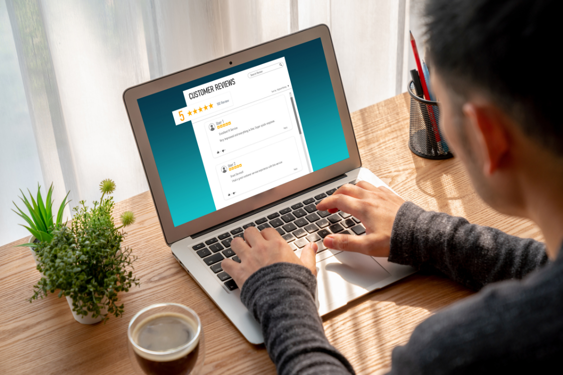 Business owner checking supplement manufacturer reviews online for reputation insights