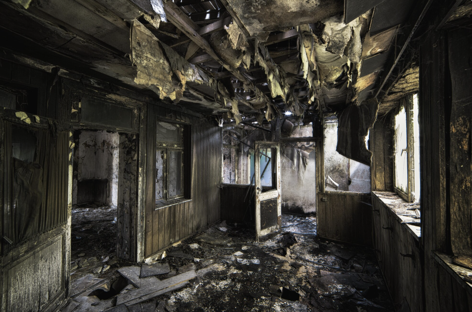 A destroyed building with burned walls