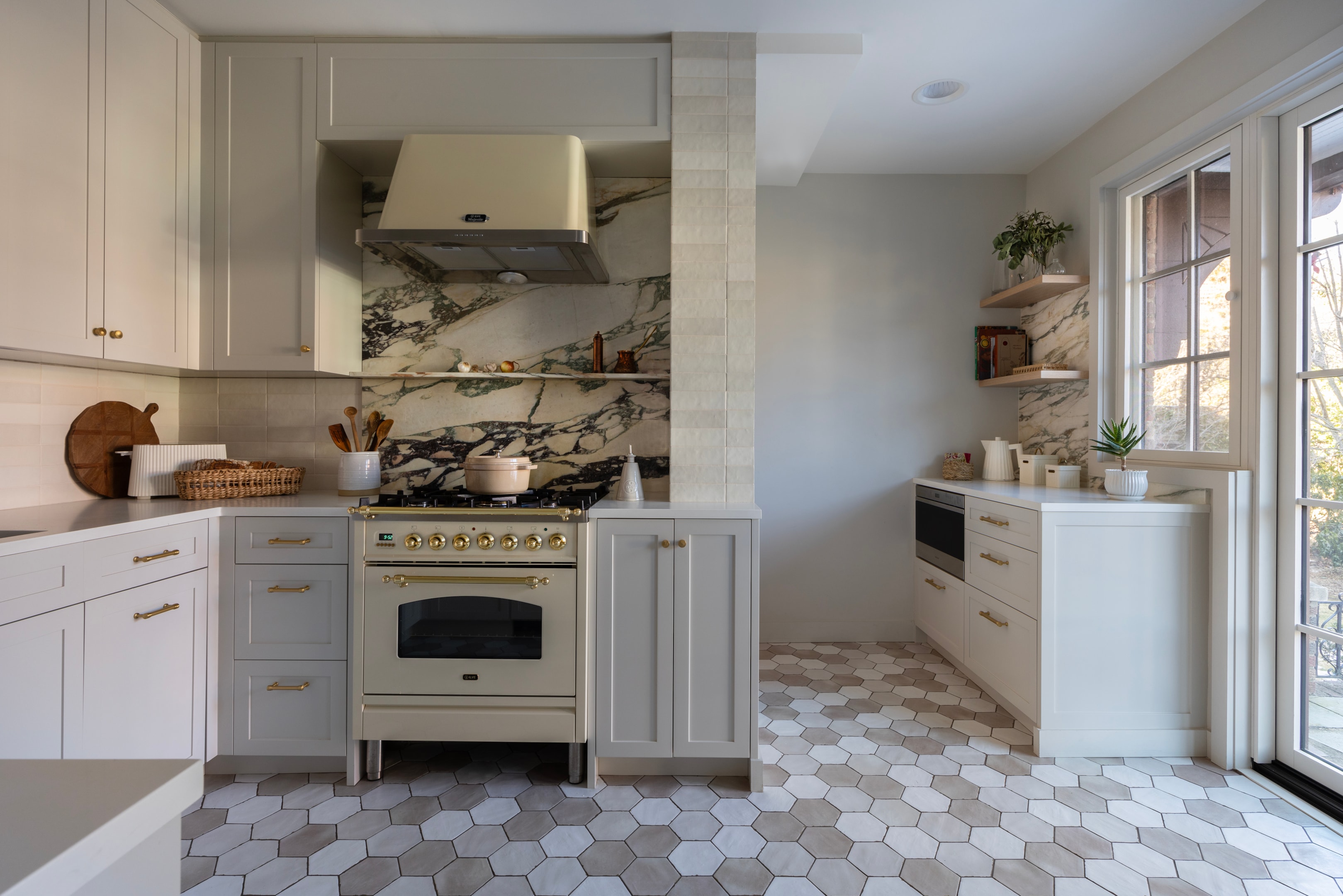 The kitchen in Paulina Hospod's stunning Forest Hills Tudor Townhouse project.