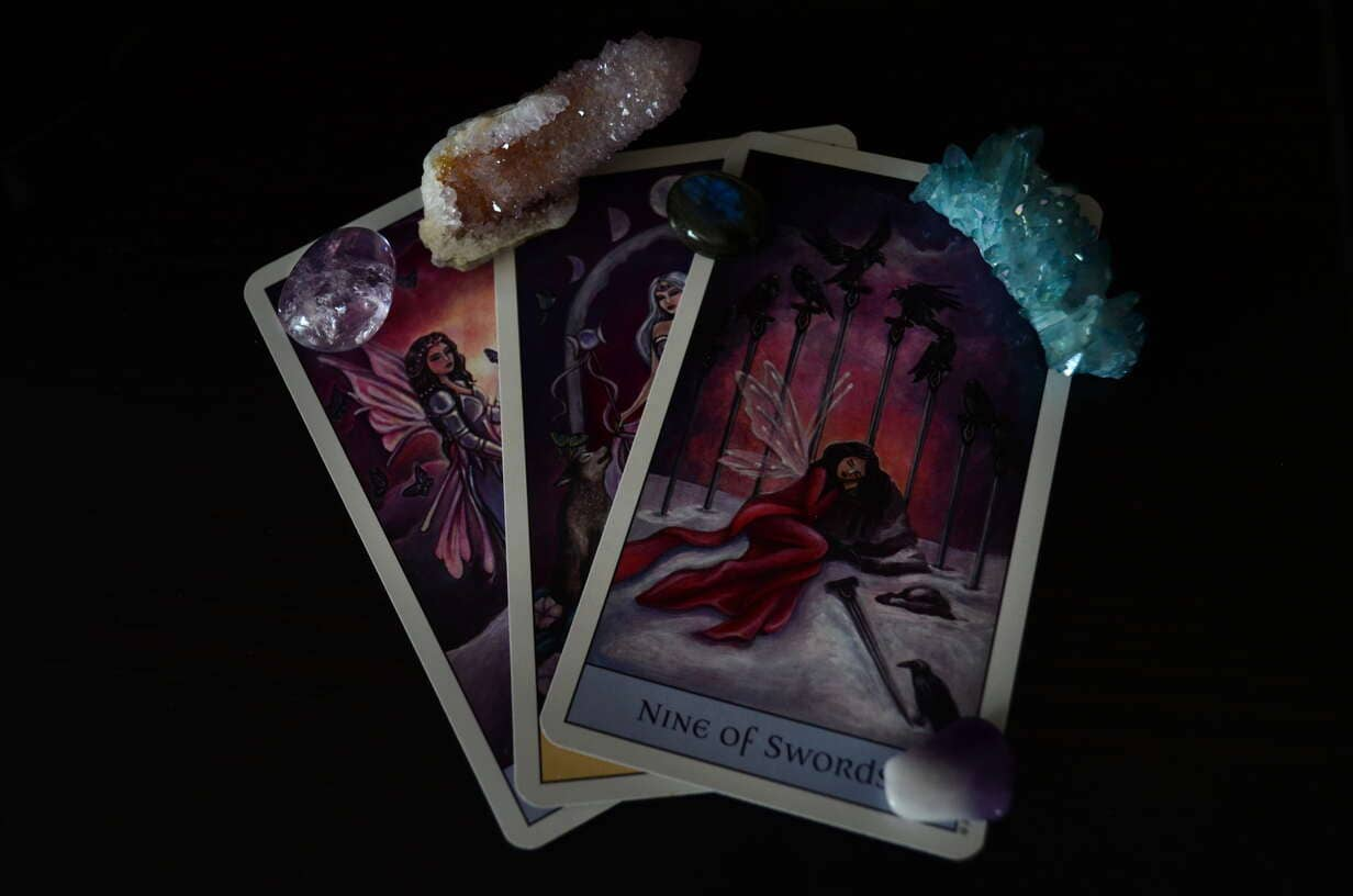 tarot cards with crystals