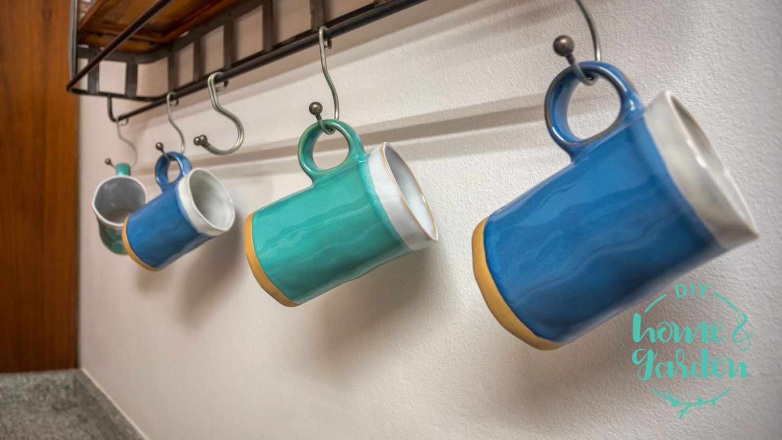 Hang cups on under counter hooks to make more counter space