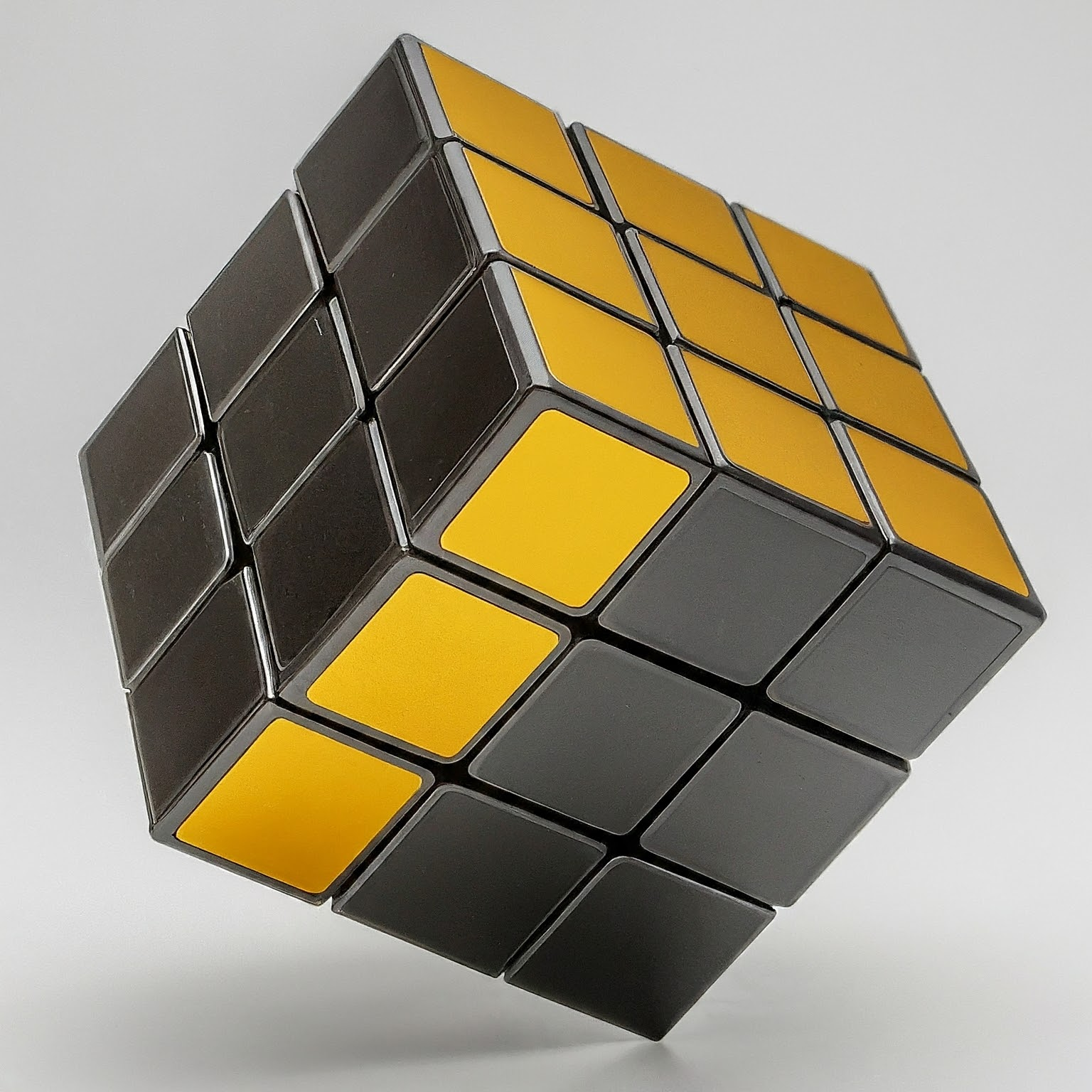 A scrambled Rubik's cube with bright and dark squares, symbolizing an overfitting machine learning model. 