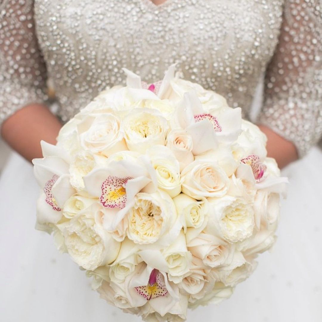  A bride wearing a chic A-line dress with a wide selection of personal style elements