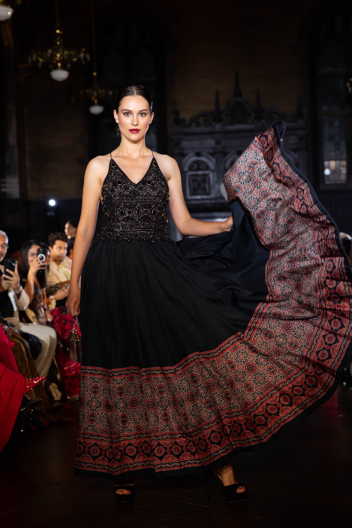 An elegant black tie event dress in a luxurious fabric.