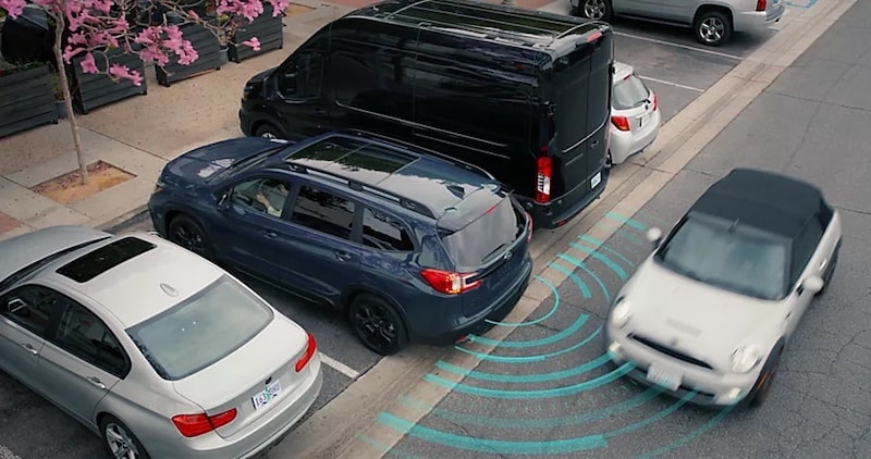 Subaru's Rear Cross-Traffic Alert detecting oncoming vehicles while reversing, available at AutoFair Subaru of Haverhill, MA, for added parking safety.