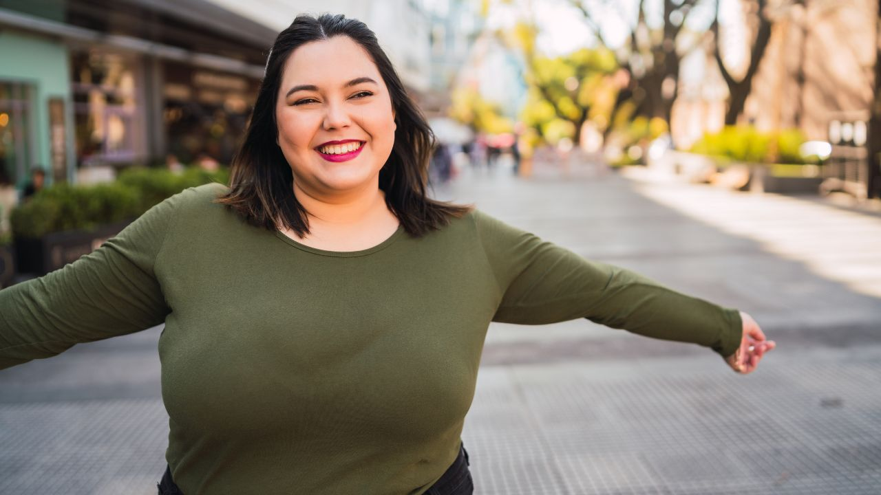 A woman wearing plus size clothing from an online store