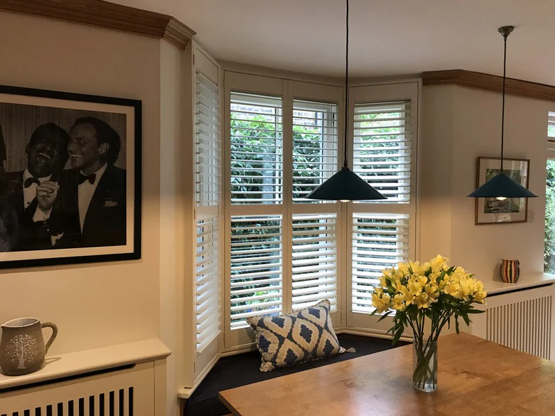 plantation shutters in bay windows 