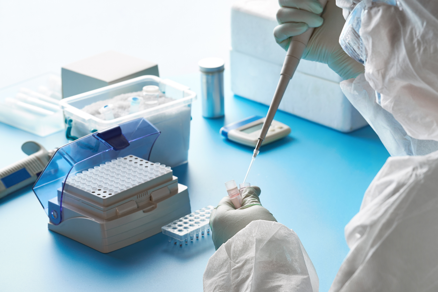 Scientist testing a sample in a lab.