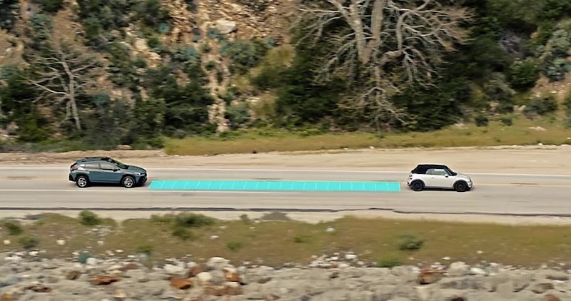 Subaru Adaptive Cruise Control system maintaining a safe following distance, featured in Subaru models at AutoFair Subaru of Haverhill, MA, ensuring stress-free highway driving.
