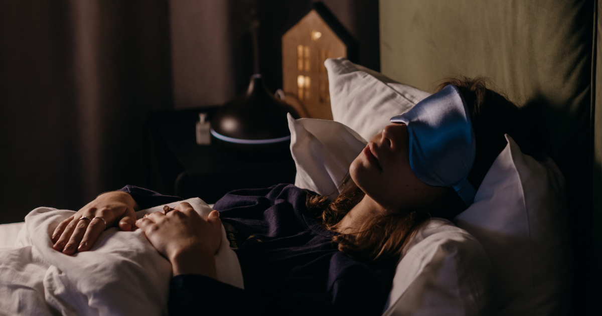 Woman using various tools to achieve quality sleep