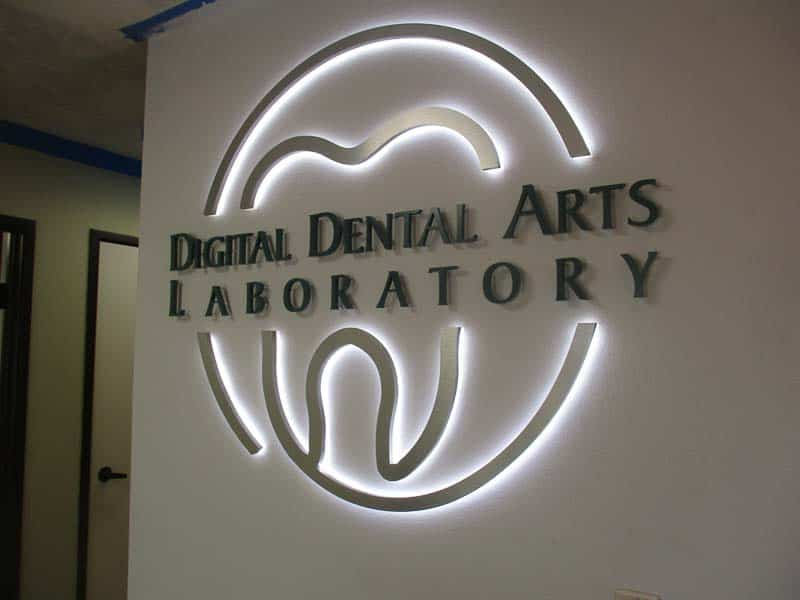 This office lobby sign uses a custom shape known as contour cut – we can cut any shape you want.