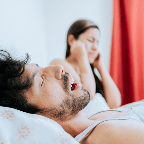person snoring loudly