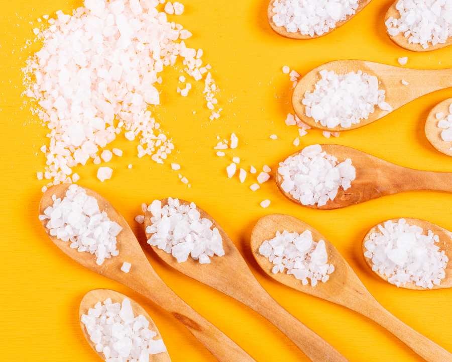 MSM (Methylsulfonylmethane): A Guide to Benefits, Dosage, and Safe Usage – many wooden spoons with MSM crystals.