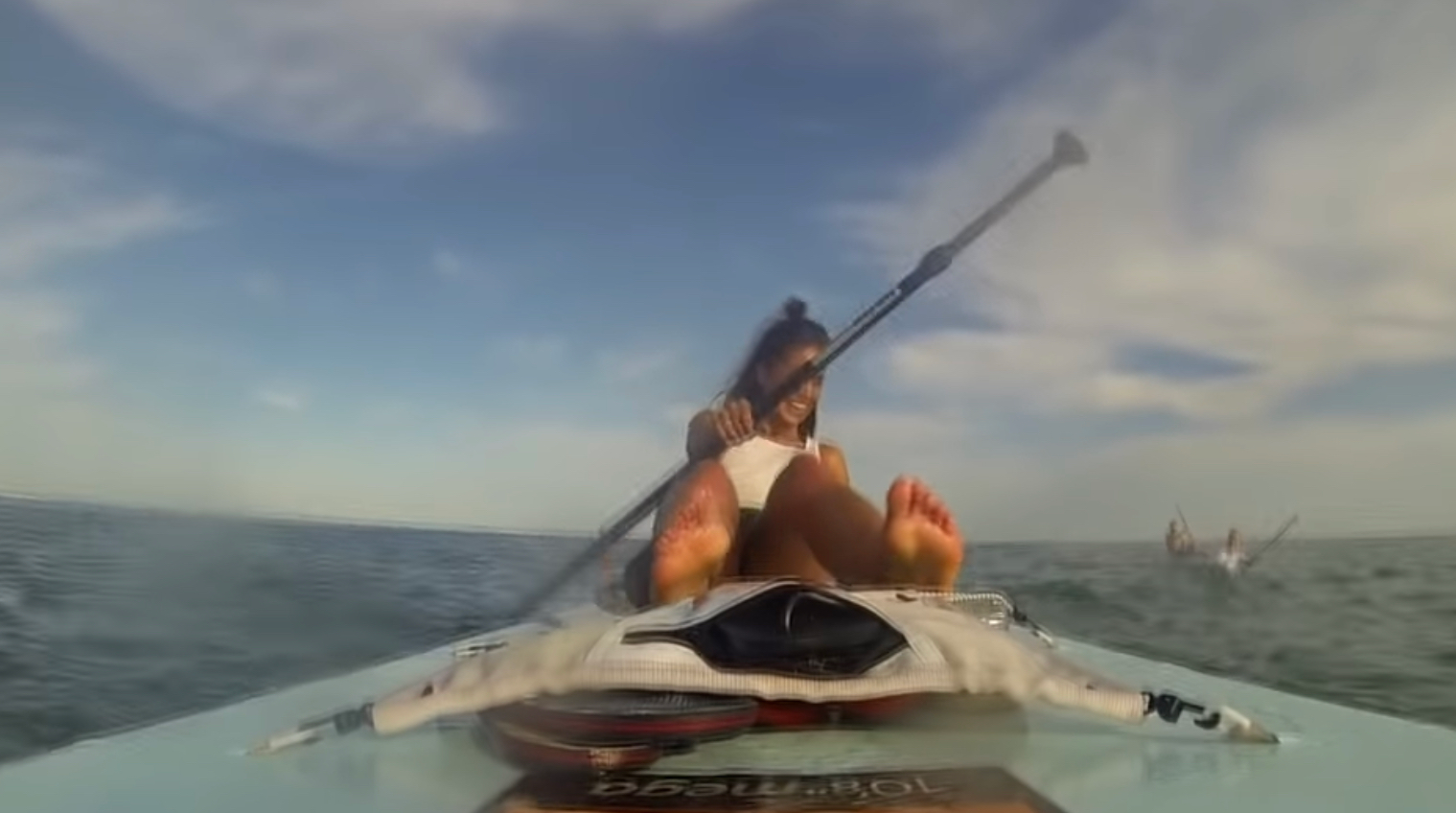 woman on a stand up paddle board