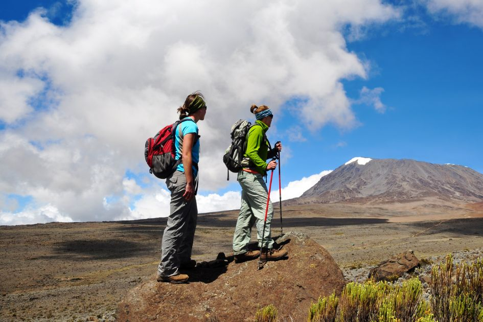 two female hikers hiking on pants