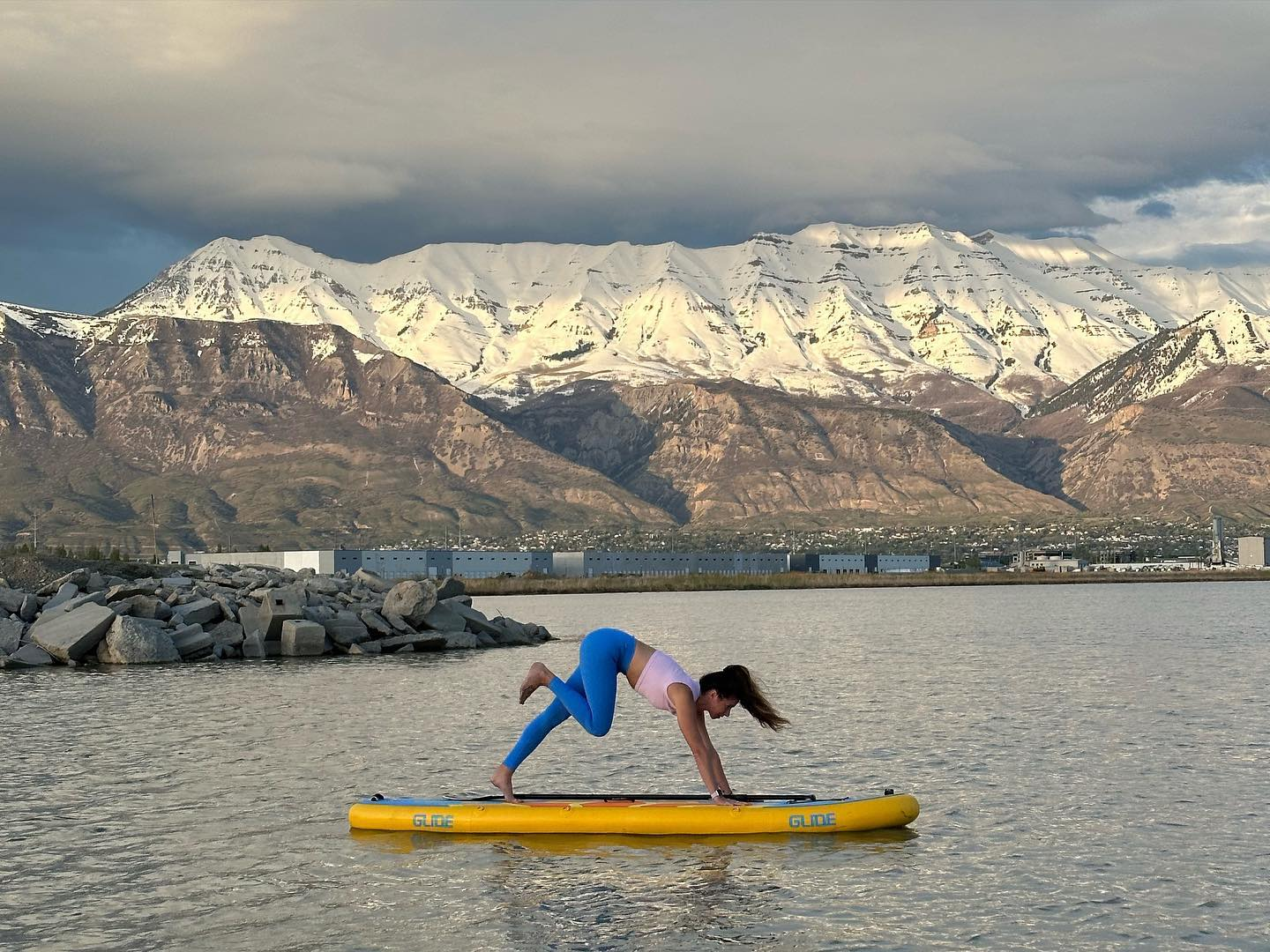 yoga on an inflatable paddleboard