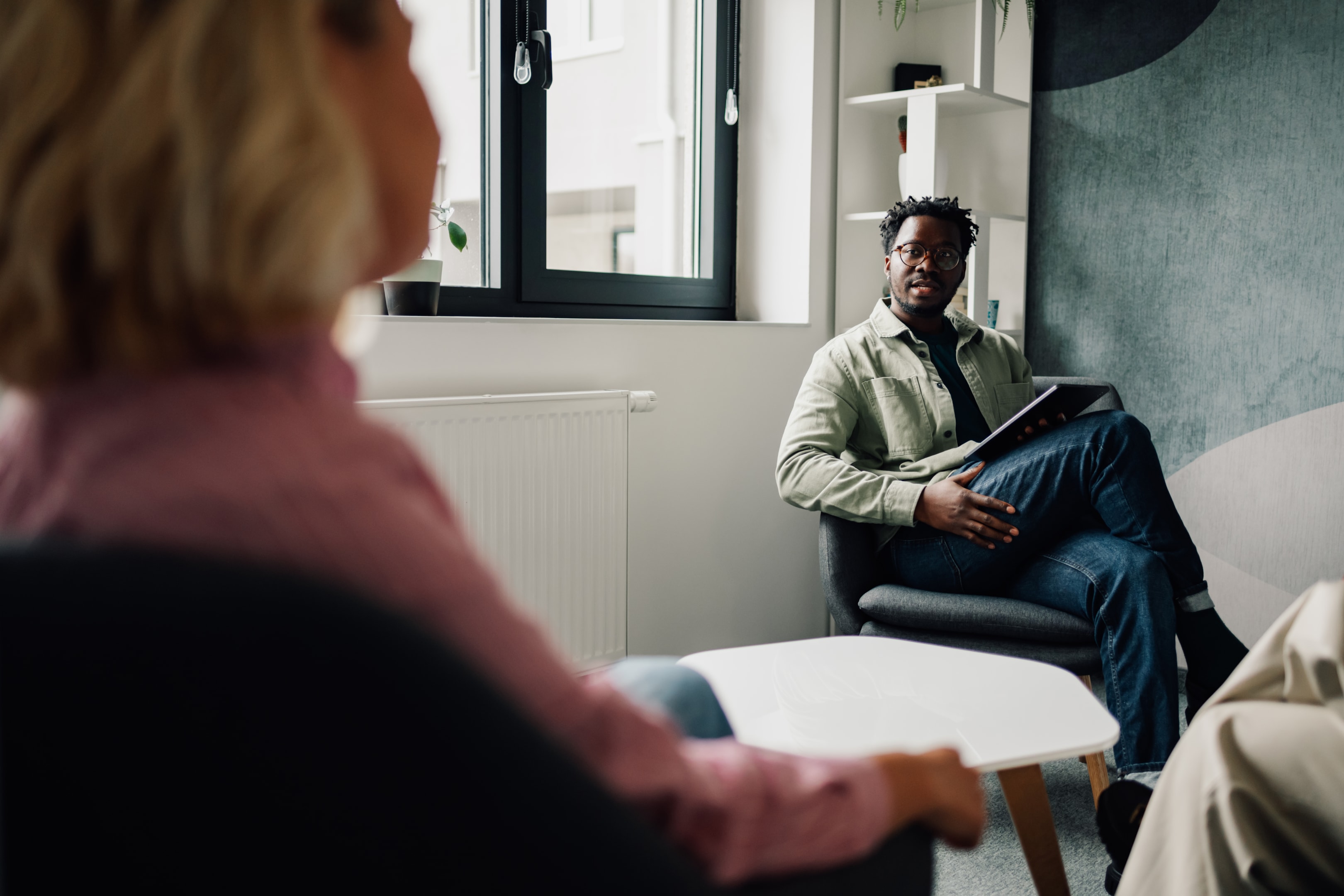 Image of schema therapist using the power of limited reparenting and empathic confrontation with a client suffering from the entitlement schema.