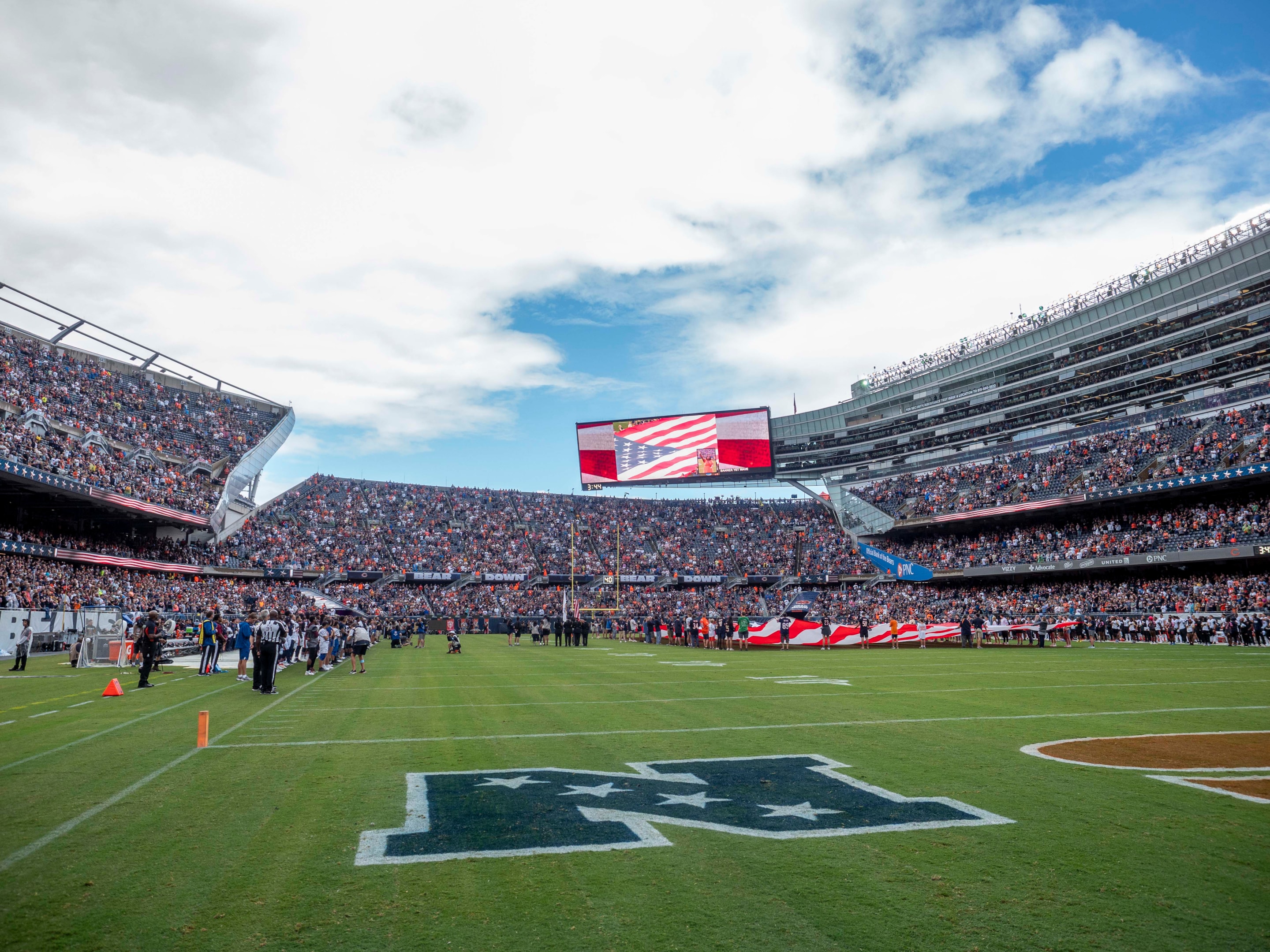  A view of the crowd in Soldier Field during the National Anthem before an NFL preseason game between the Cincinnati Bengals and the Chicago Bears on August 17, 2024 in Chicago, Illinois.