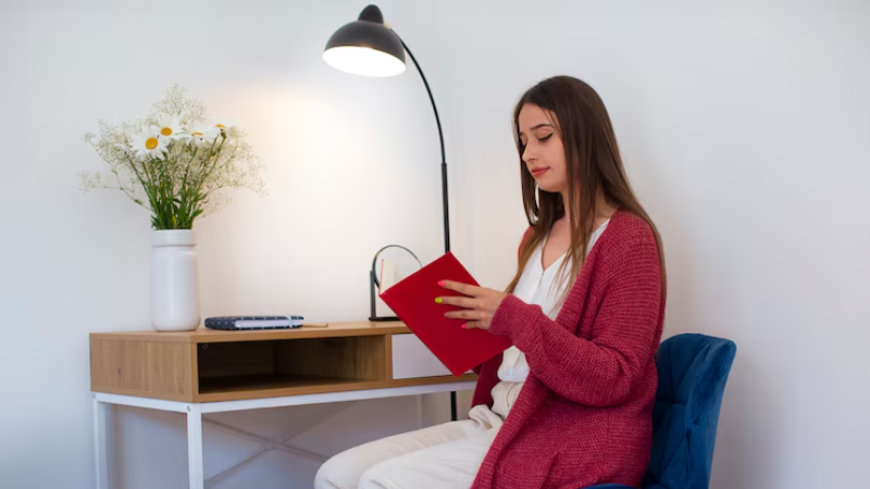 A well-lit home office having an LED lamp that is both energy-efficient and smart