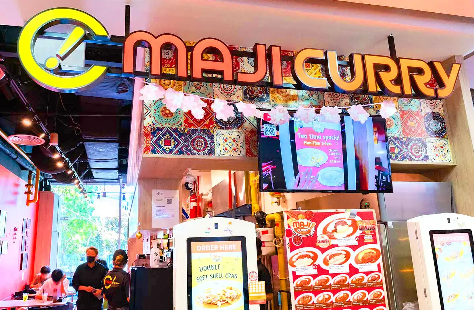 Maji Curry Singapore storefront in Novena featuring Japanese curry restaurant signage and colourful interior