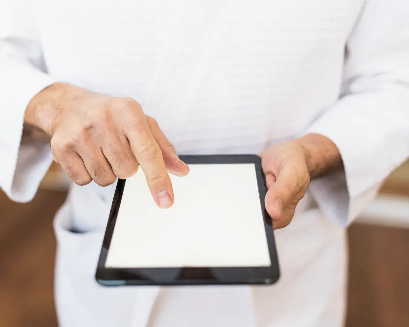 Restaurant staff using a tablet for digital menu management and Google Business Profile updates, illustrating restaurant SEO, online ordering, and digital operations.