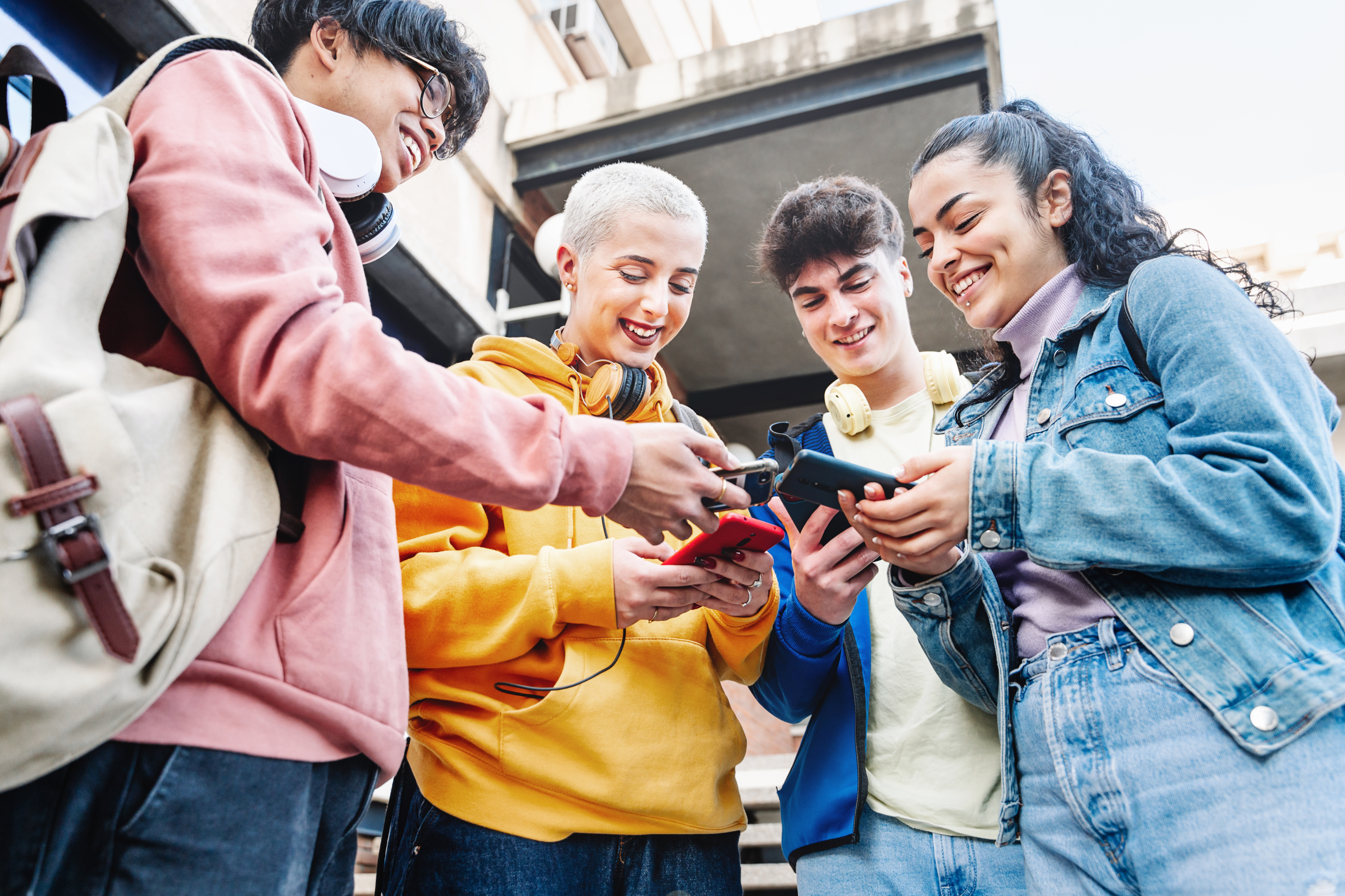 Group of people using mobiles