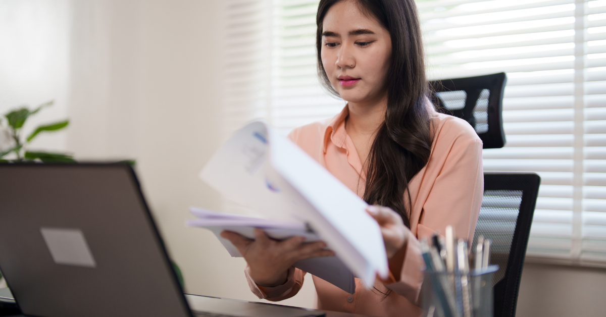 A woman is learning about the difference between C Corp and S Corp.