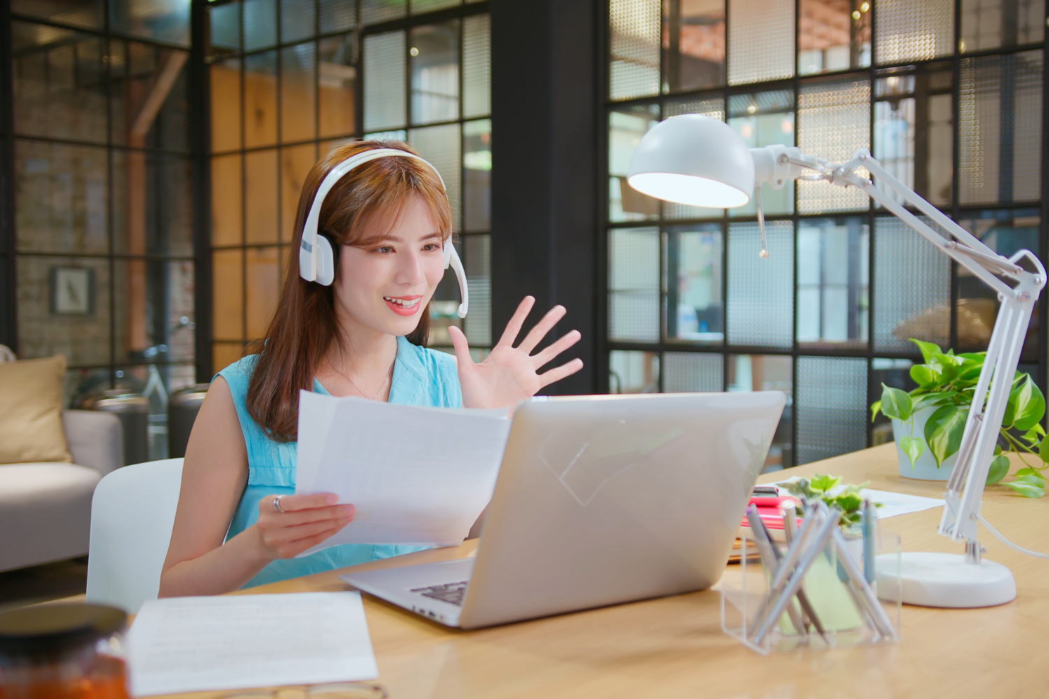 Interviewee reading from notes during a virtual interview.
