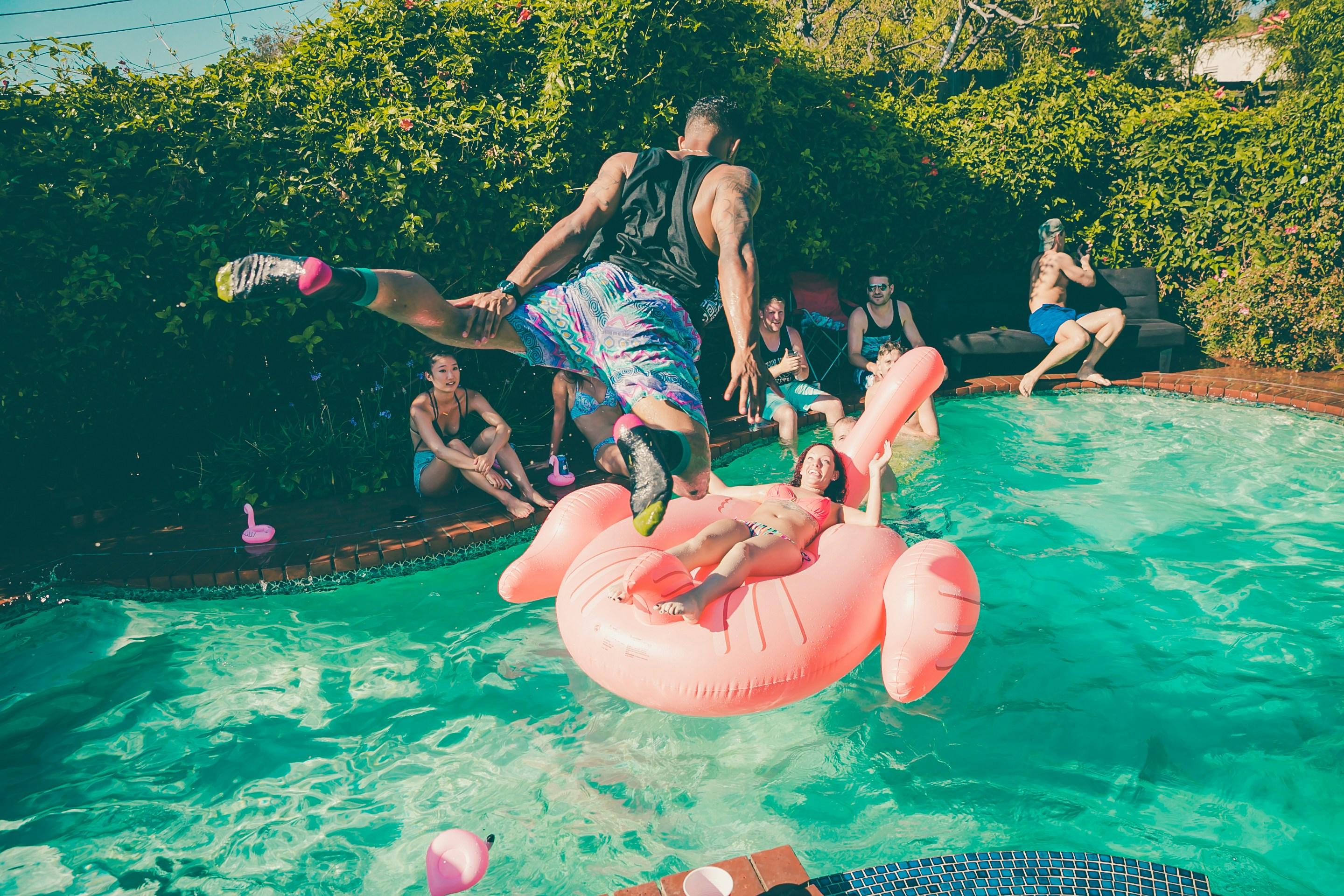 mage captures teenagers on summer break at a pool party having fun and not worrying about responsibilities