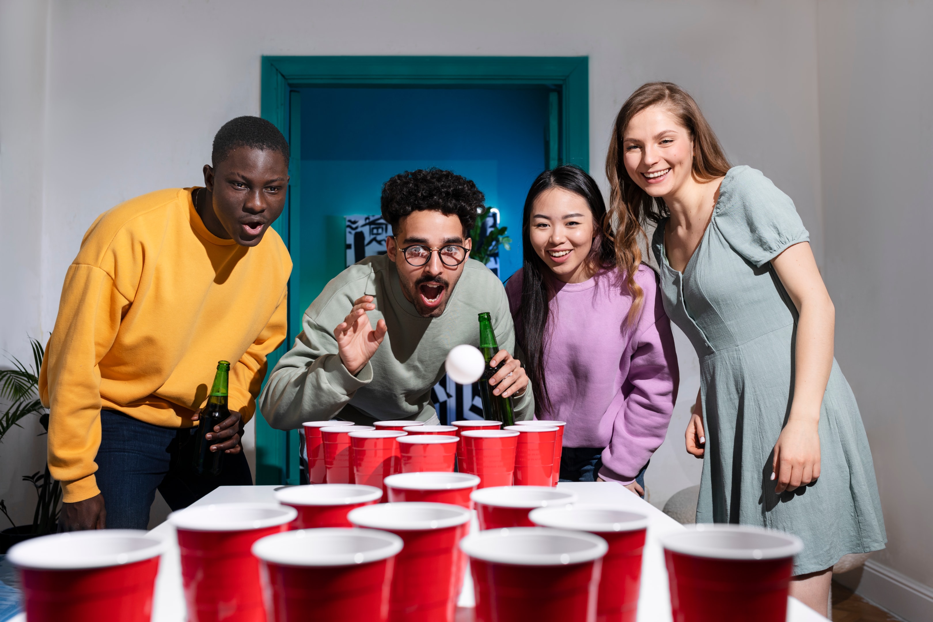 people playing beer pong