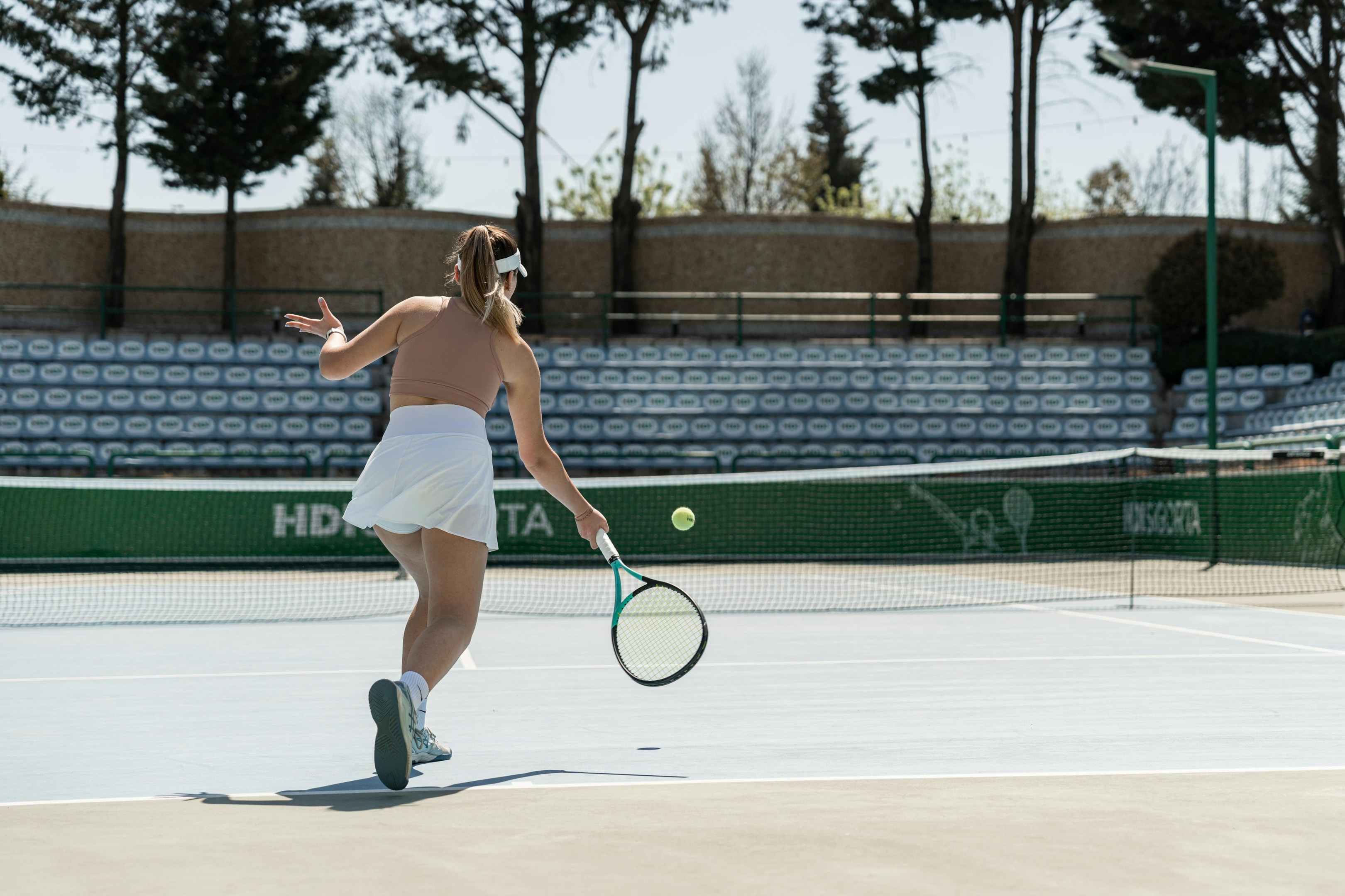 Photo by Ahmed ツ: https://www.pexels.com/photo/woman-playing-tennis-on-a-court-22775593/